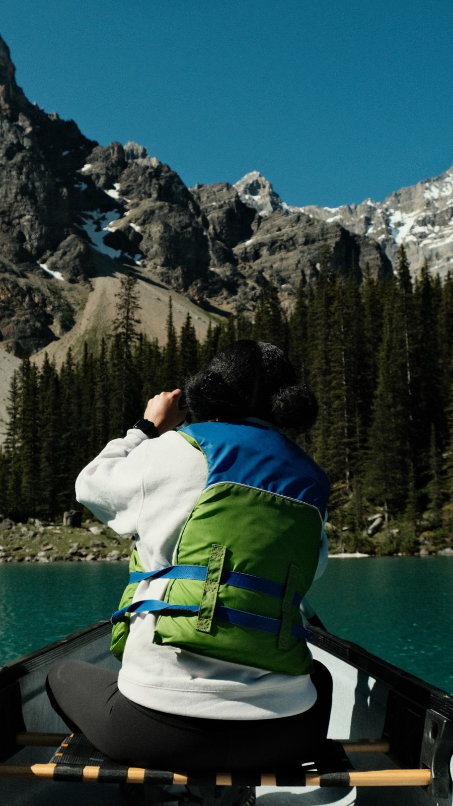Canoeing on turquoise mountain lake